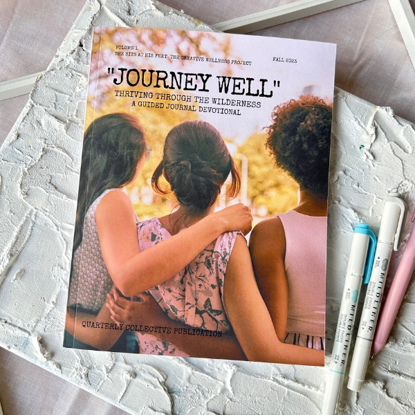 She Sits At His Feet